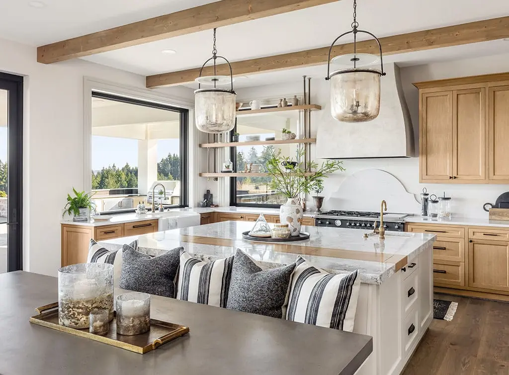 Go for glass pendants in a country style kitchen