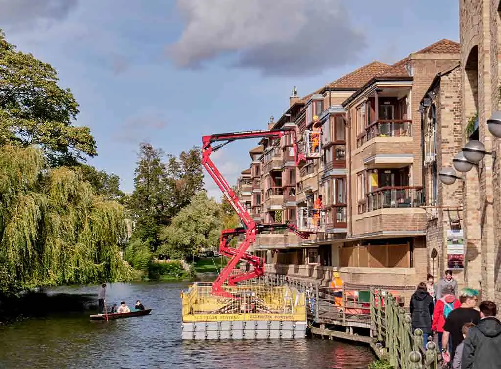 Cherry picker hire in use for access to a residential block