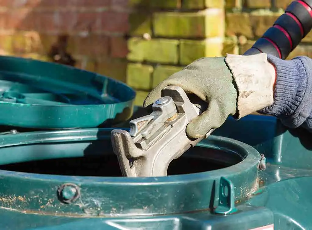 An external oil tank being filled with oil