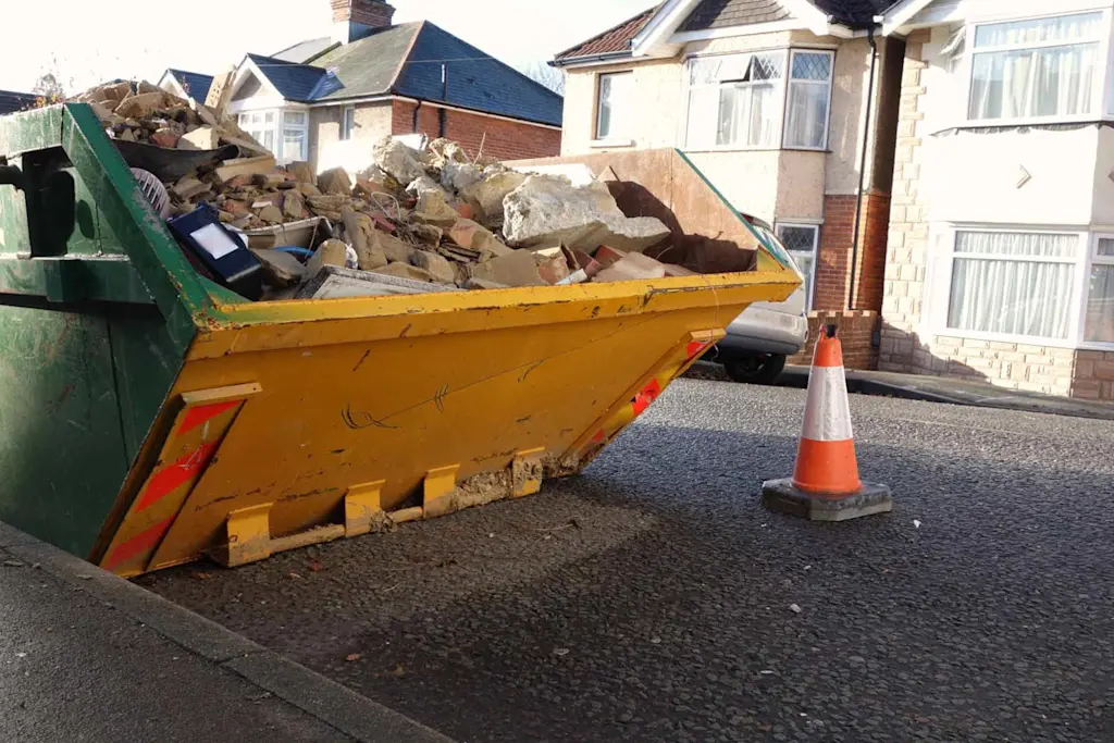 Who pays for a skip – me or my tradesperson?