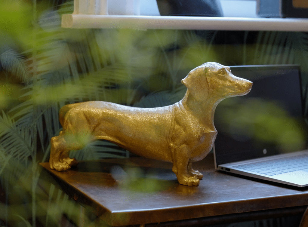 Gold sausage dog ornament in the Checkatrade house tour secret room