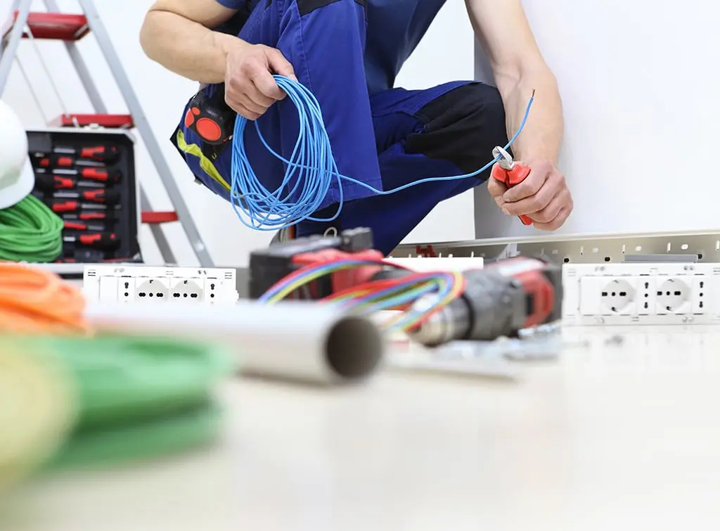 https://www.checkatrade.com/blog/wp-content/uploads/2024/01/trade-Electrician-side-hustles-Image-4.jpg