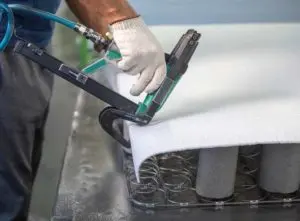 Fixing springs on a sagging sofa