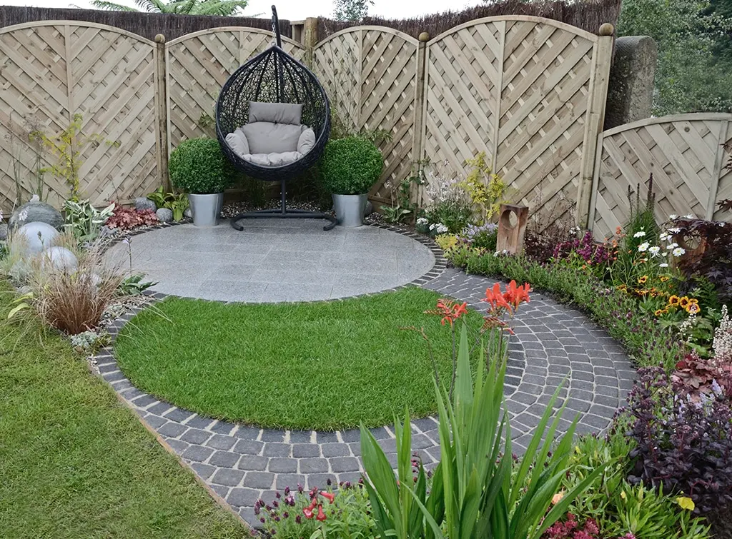 Swing chair in small garden