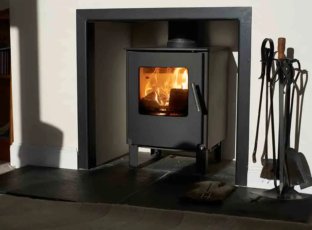 https://www.checkatrade.com/blog/wp-content/uploads/2020/11/Wood-stove-design-ideas-photos.jpg