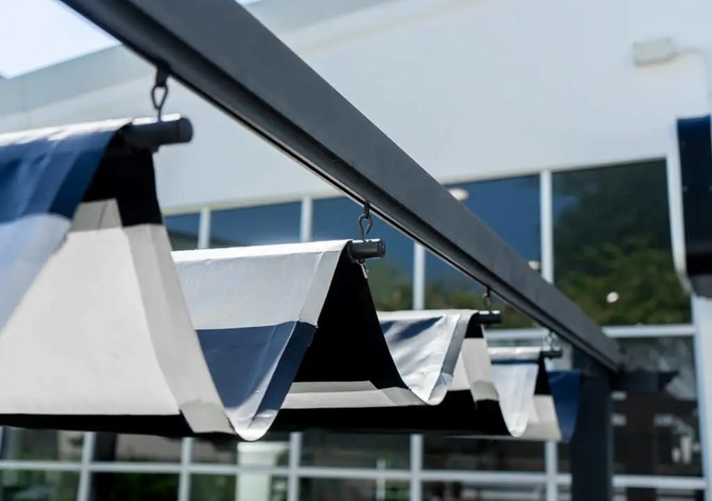 https://www.checkatrade.com/blog/wp-content/uploads/2024/05/awnings-and-external-shading-for-garden-1024x721.jpeg