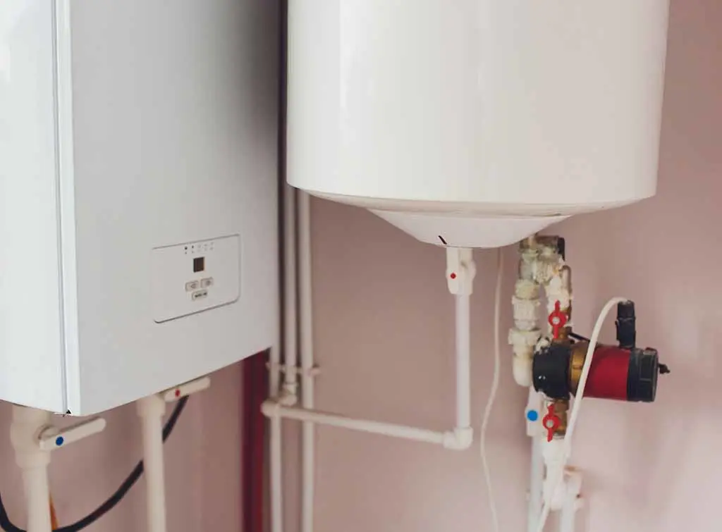 https://www.checkatrade.com/blog/wp-content/uploads/2022/03/how-to-fit-a-thermostat-to-a-hot-water-cylinder.jpg