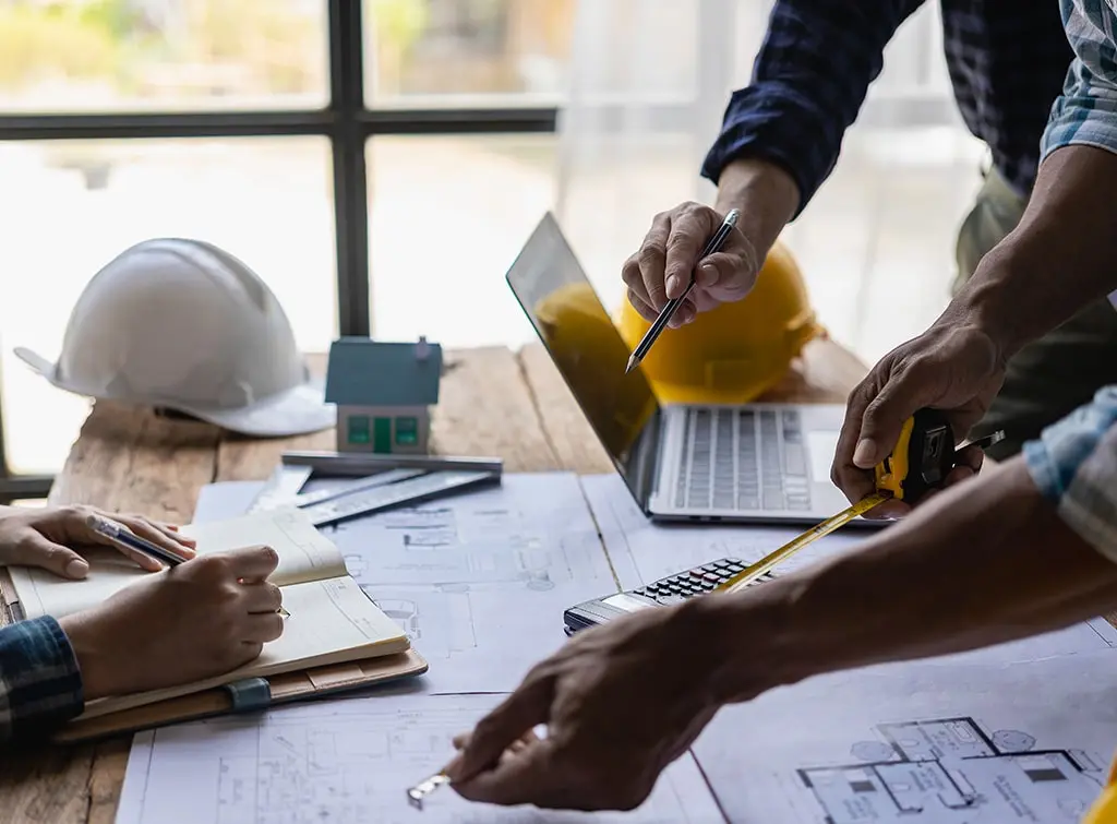 https://www.checkatrade.com/blog/wp-content/uploads/2023/10/building-project-planning.jpg