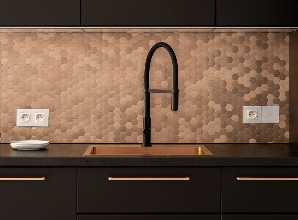 Copper hexagonal tiled splashback generated by AI