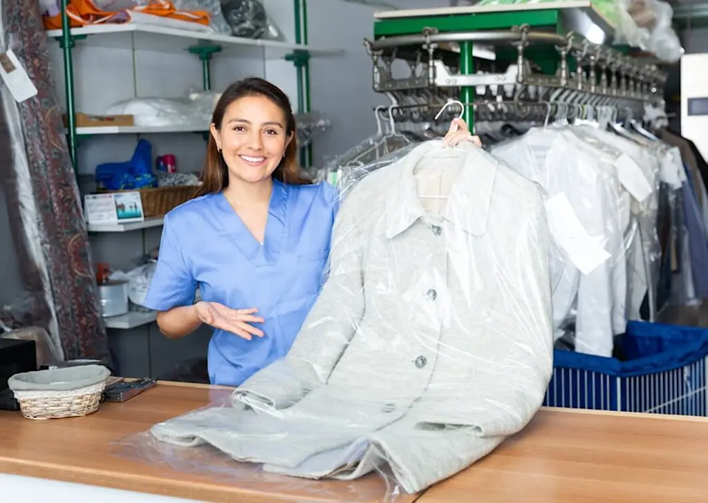 Proud dry cleaner shows work