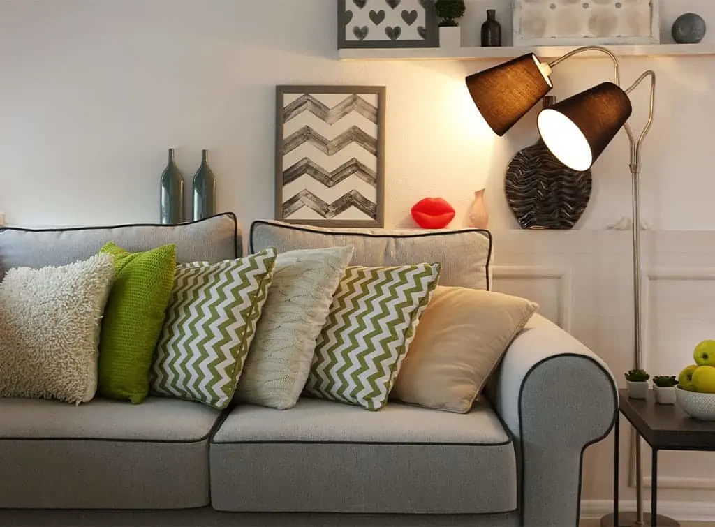 Floor lamp in a living room next to a sofa