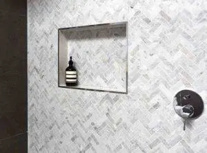 https://www.checkatrade.com/blog/wp-content/uploads/2020/10/How-much-does-a-recessed-shower-shelf-cost_-300x221.jpg