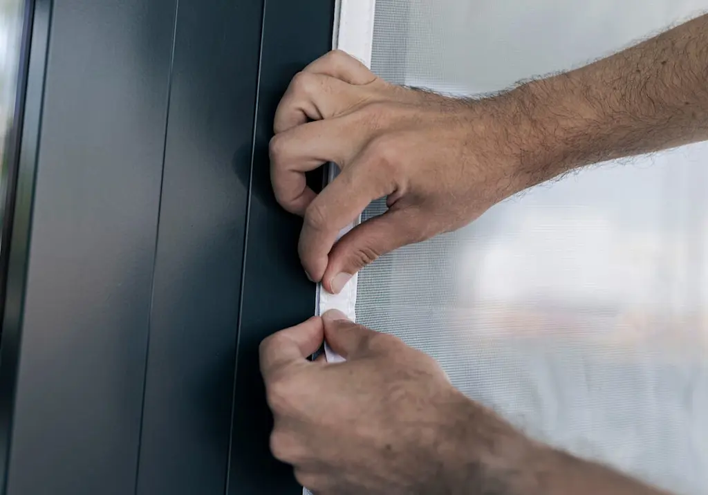 attaching-fly-screen-velcro-strip-door