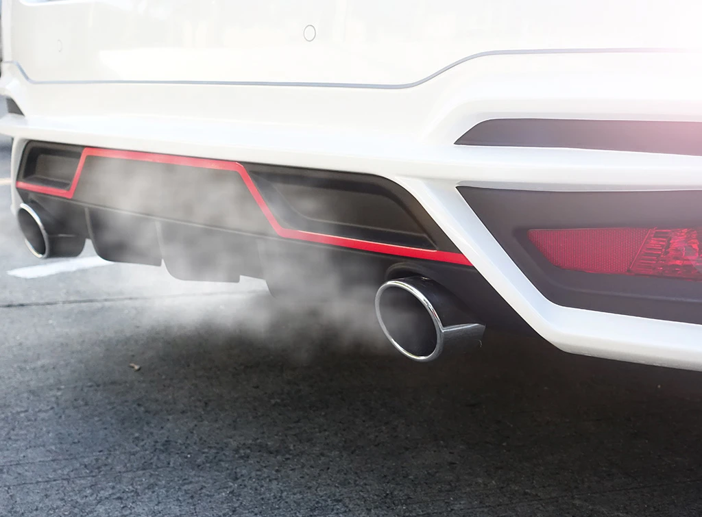 White smoke coming from the exhaust of a car