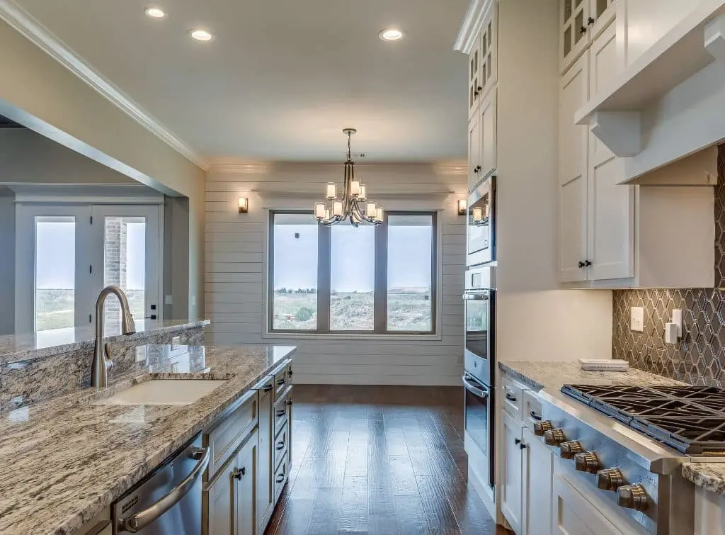 Black and white marble worktops with white decor