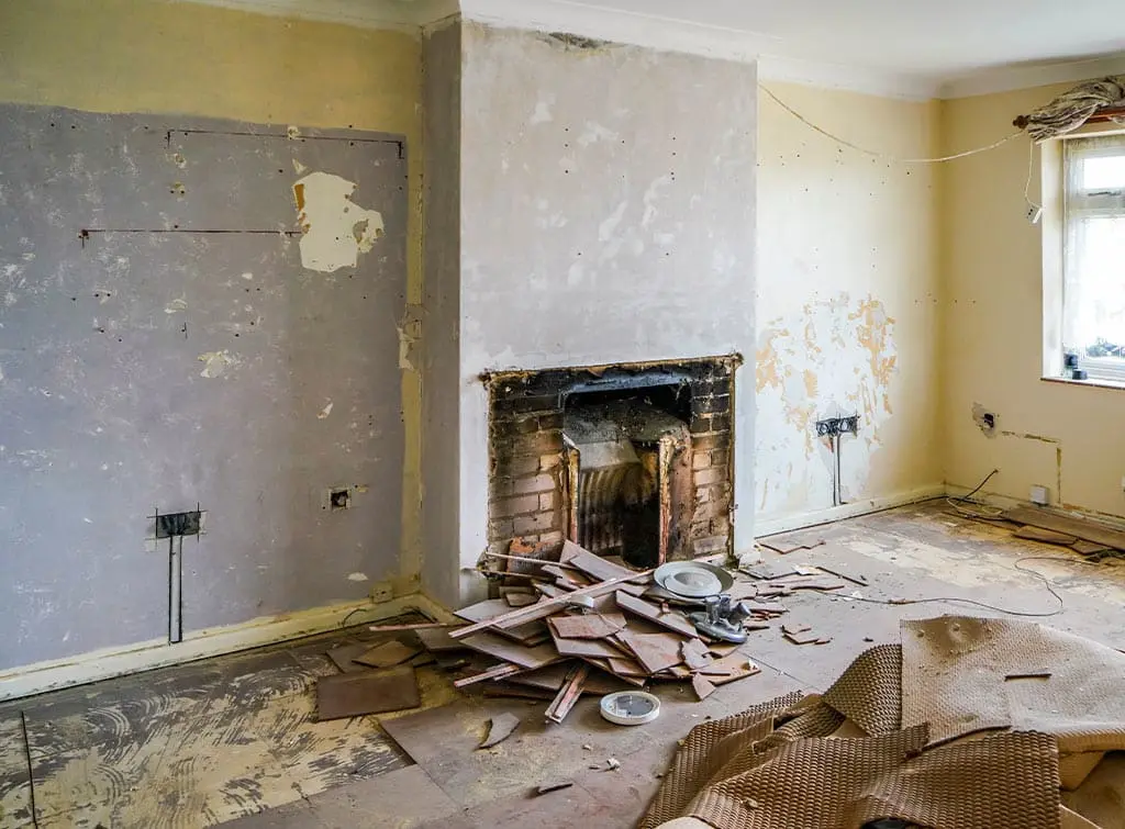 Beginnings of chimney breast removal, starting with removal of fire surround