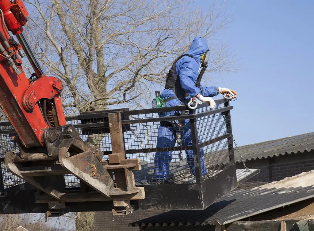 PPE with respiratory equipment for asbestos removal