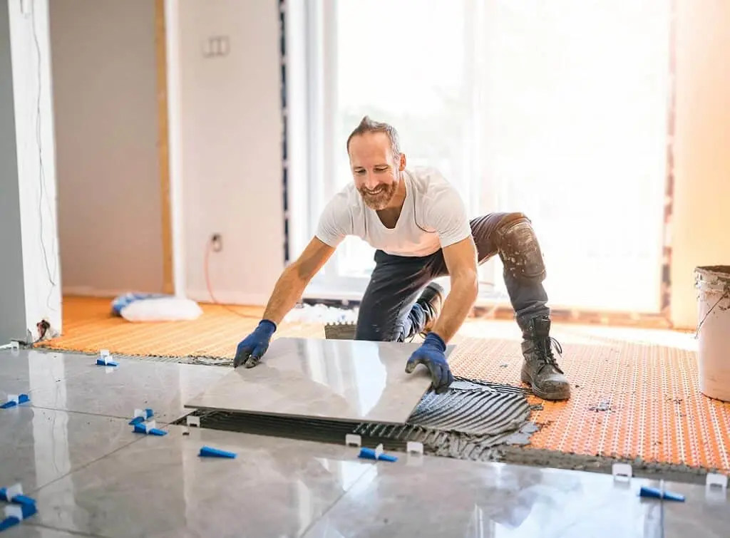 https://www.checkatrade.com/blog/wp-content/uploads/2025/01/tile-flooring-laid-by-a-specialist.jpeg