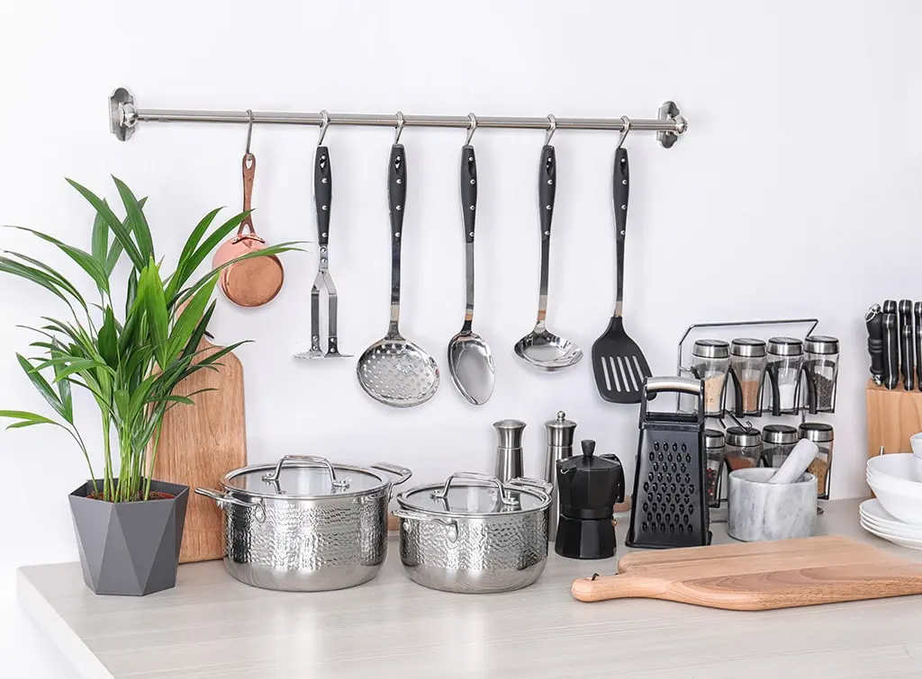 kitchen rail with utensils
