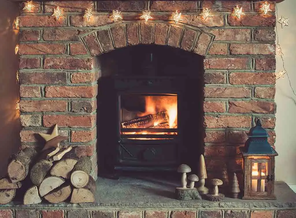 Chimney flue liner installation for wood burner
