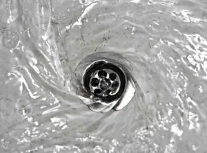 Unblock bath drain pipe. Free flowing water down a drain