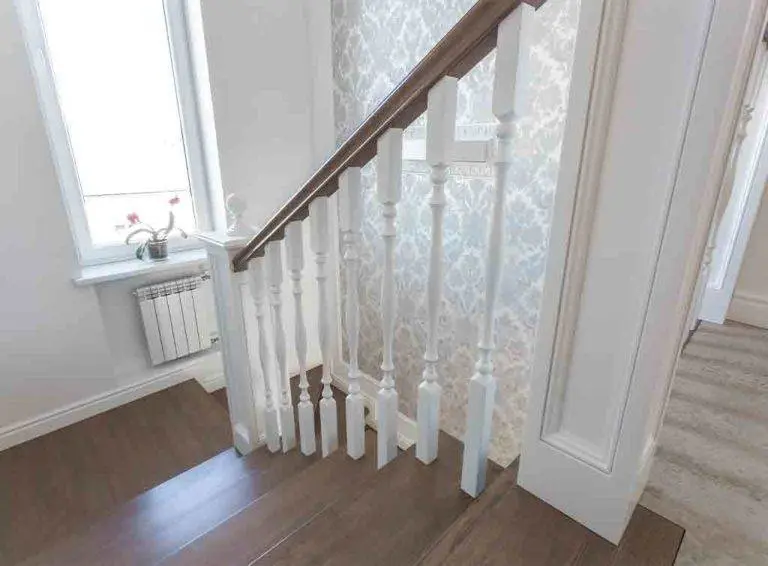 Wooden staircase, banister and spindles