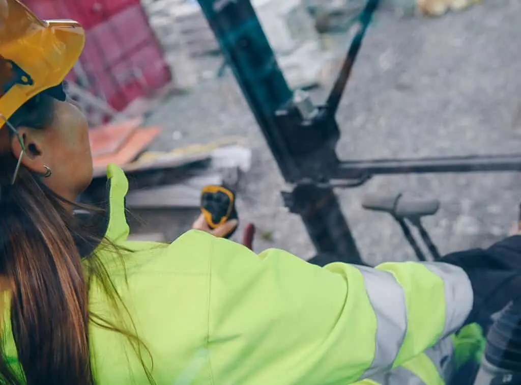 https://www.checkatrade.com/blog/wp-content/uploads/2022/08/womens-workwear-jacket-operating-plant-machinery-1024x756.jpeg