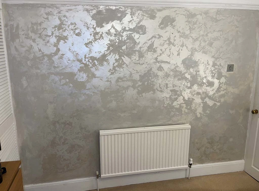 Silver Venetian plaster wall by [Majestic Plastering](https://www