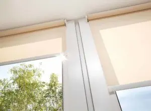 Roller blinds in a window