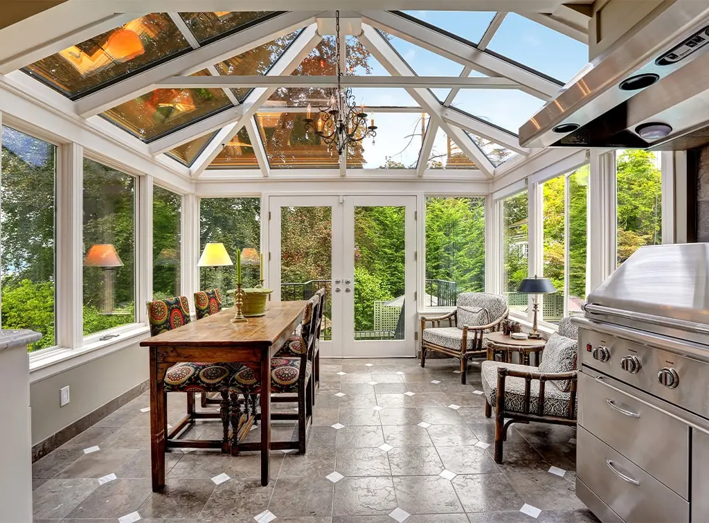 Orangery dining room with floral upholstery