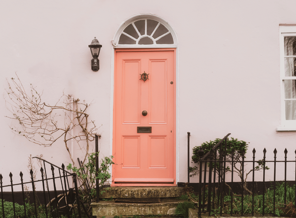 Front door painted in a peach colour