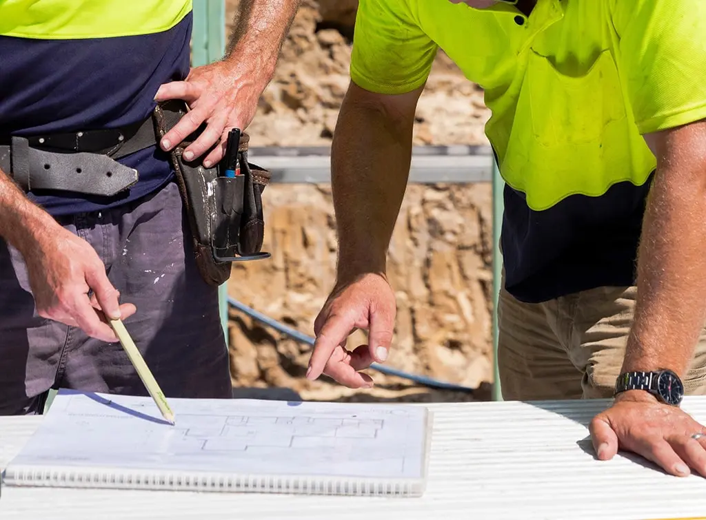 https://www.checkatrade.com/blog/wp-content/uploads/2023/09/what-builders-earn.jpg