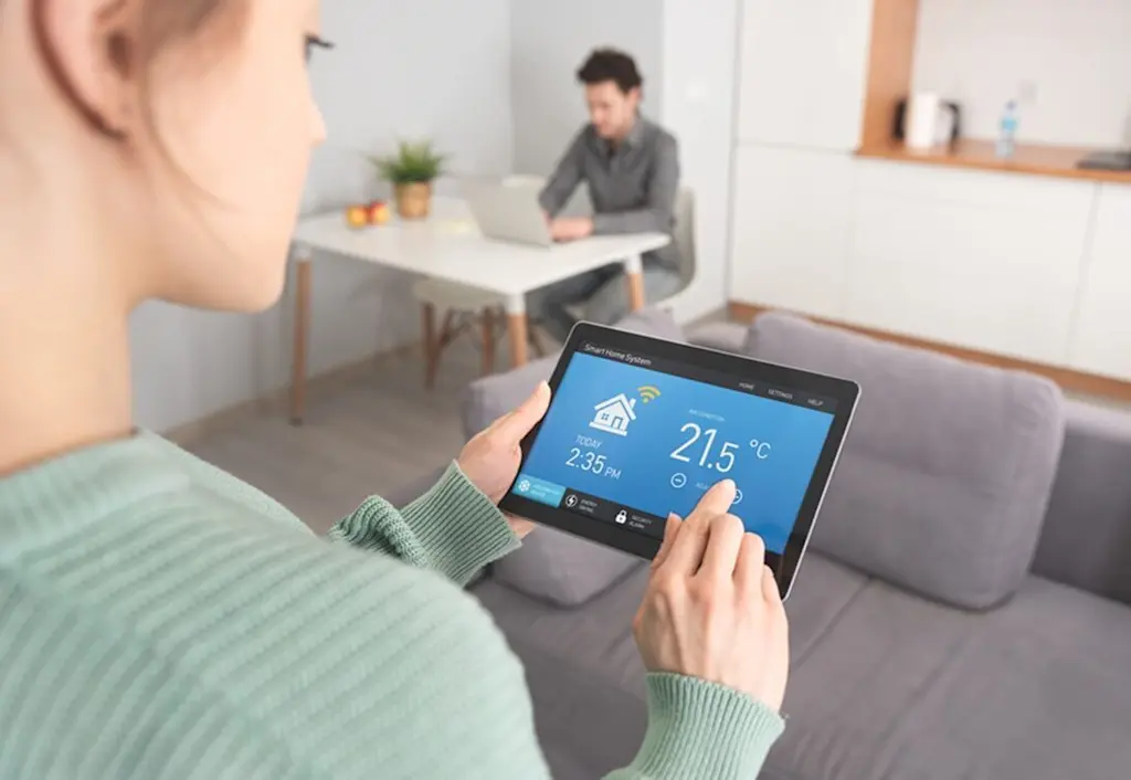 Smart thermostat linked to tablet