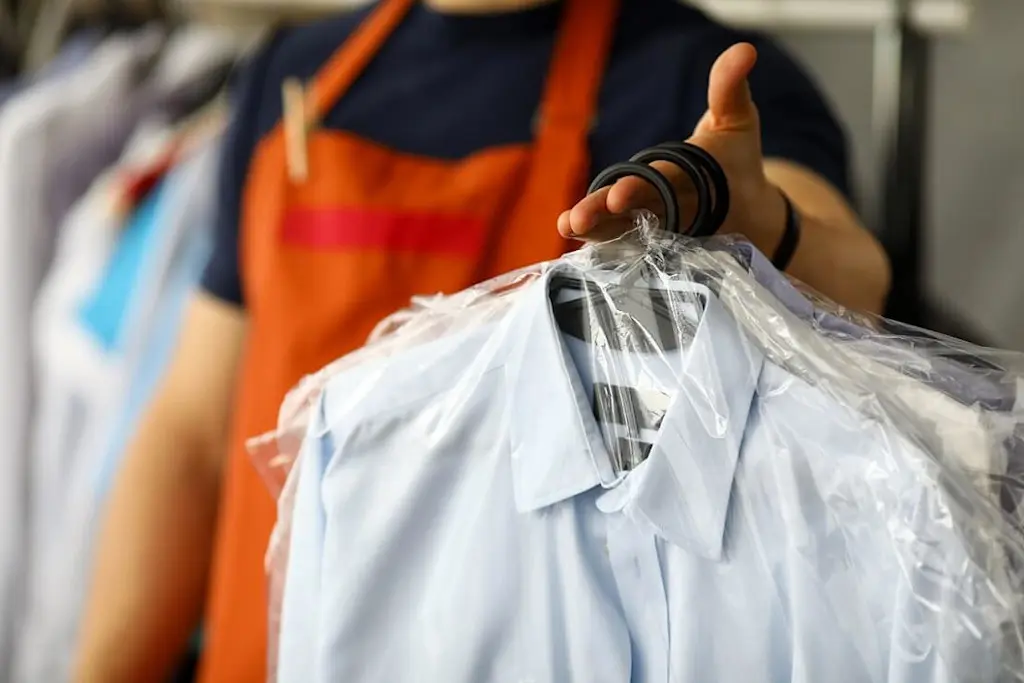 laundered shirts on hangers