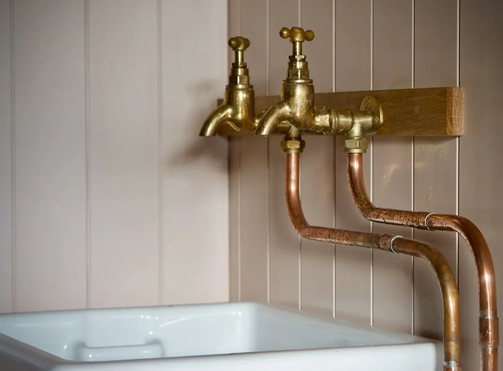 https://www.checkatrade.com/blog/wp-content/uploads/2023/11/Boot-room-butlers-sink.jpg