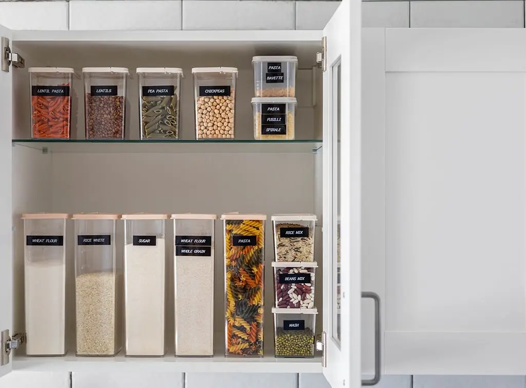 organised pantry items in cupboard