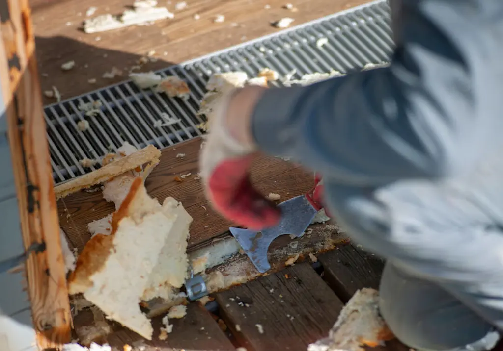 Removing expanding spray foam insulation