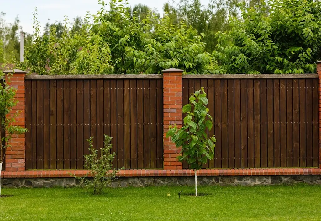 Garden with varnished close board fence