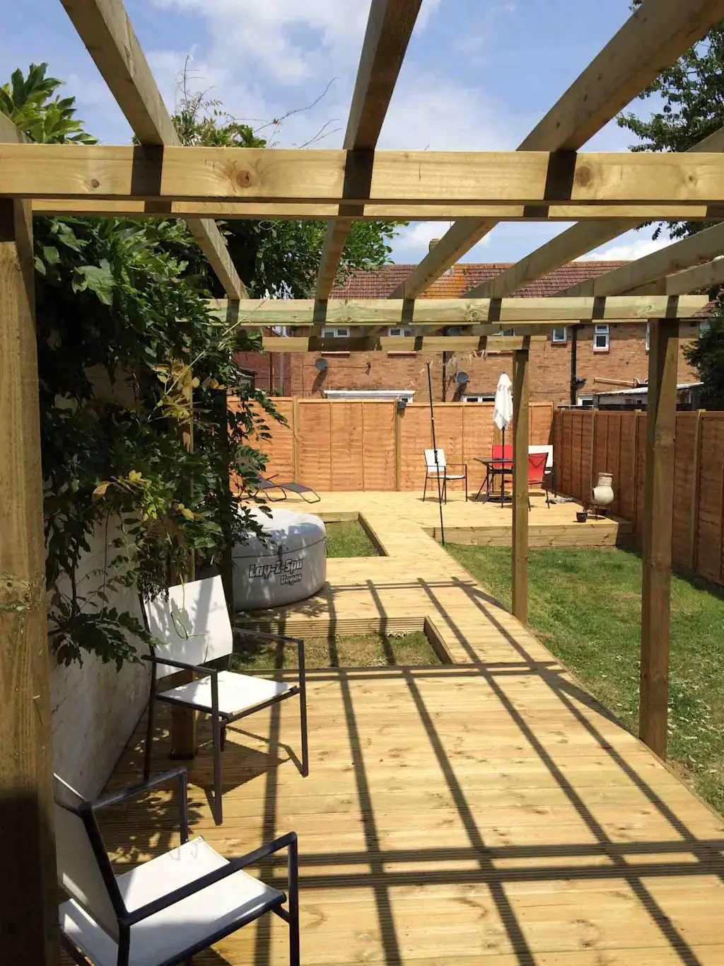 Outdoor decking in a garden with seating