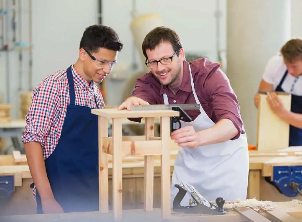 https://www.checkatrade.com/blog/wp-content/uploads/2022/06/retraining-at-40-in-carpentry-1.jpeg
