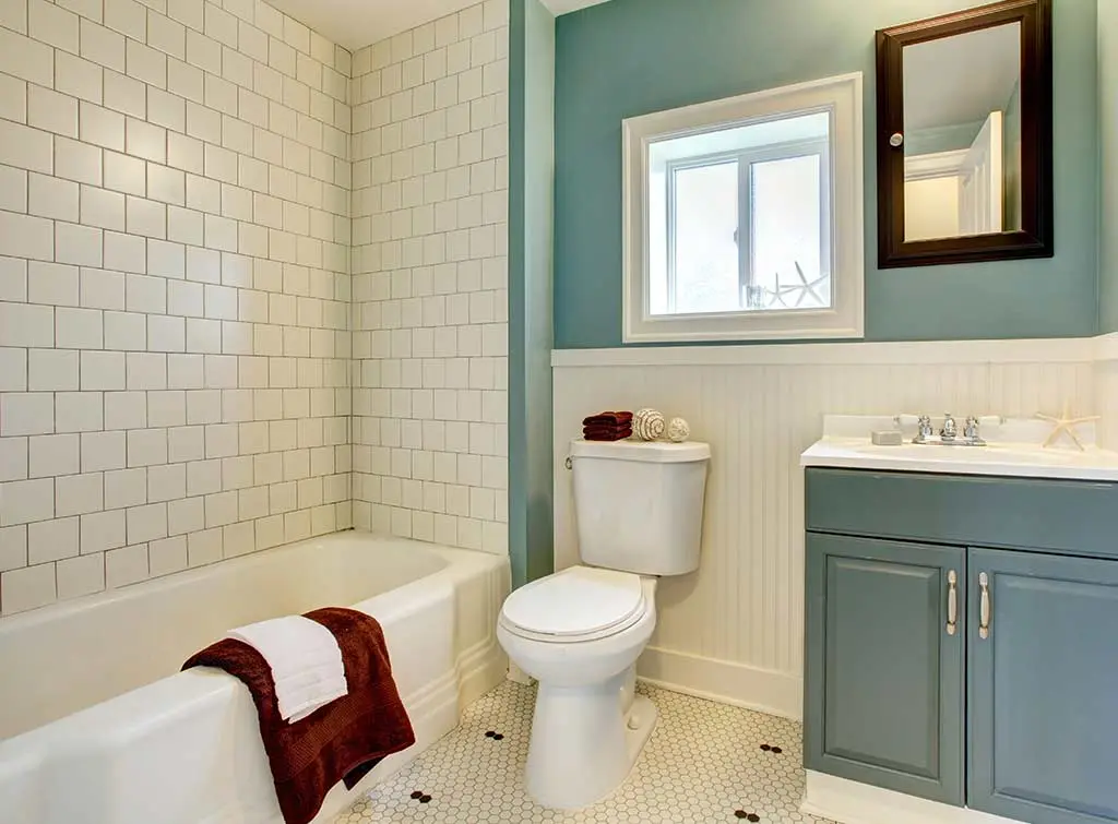 Painted wall as a cheap bathroom makeover idea
