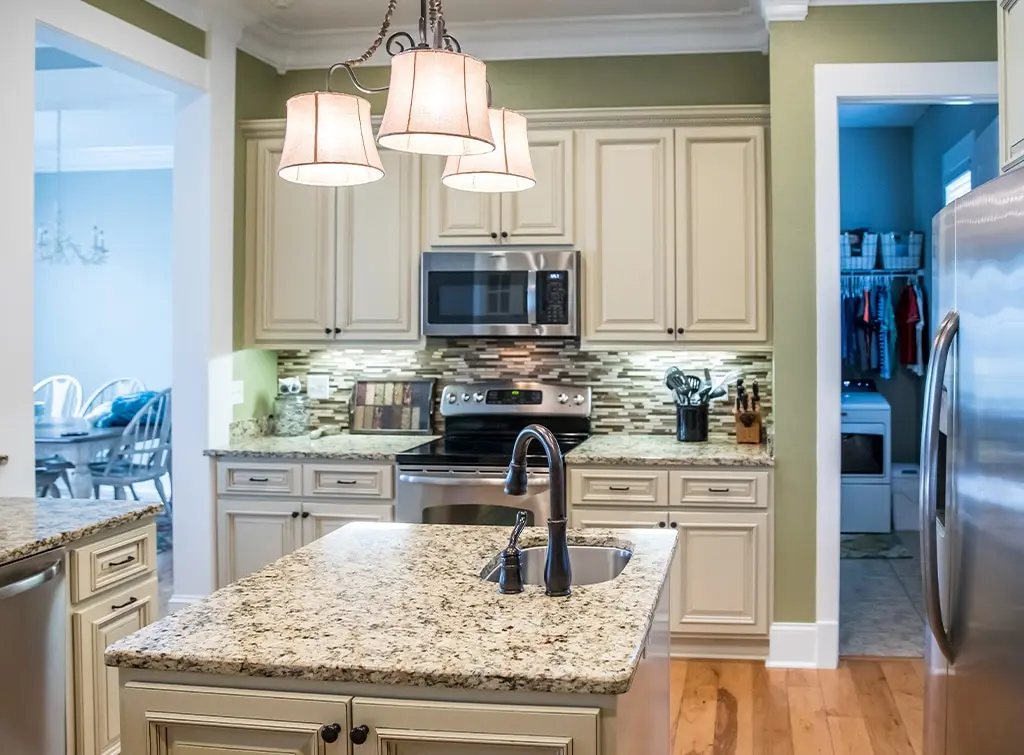sage green and cream kitchen