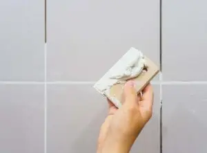 How to regrout tiles for a showhome finish