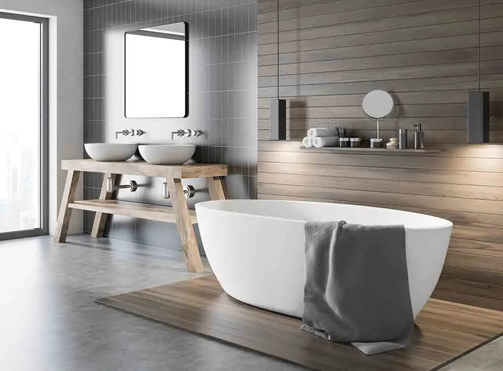 Natural bathroom with free standing bath and wooden fixtures
