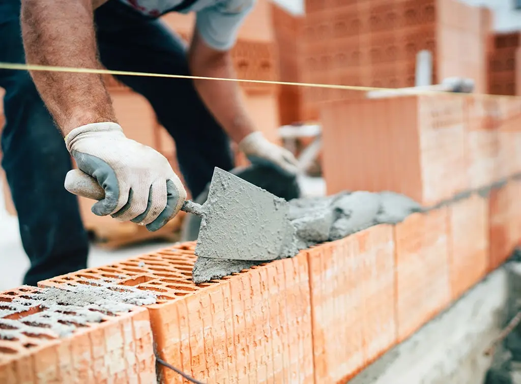 https://www.checkatrade.com/blog/wp-content/uploads/2023/09/skills-of-bricklayer.jpg