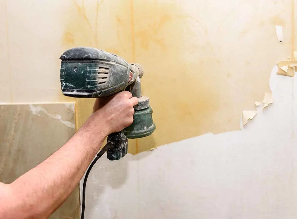 https://www.checkatrade.com/blog/wp-content/uploads/2021/10/How-to-remove-wallpaper-glue_.jpg