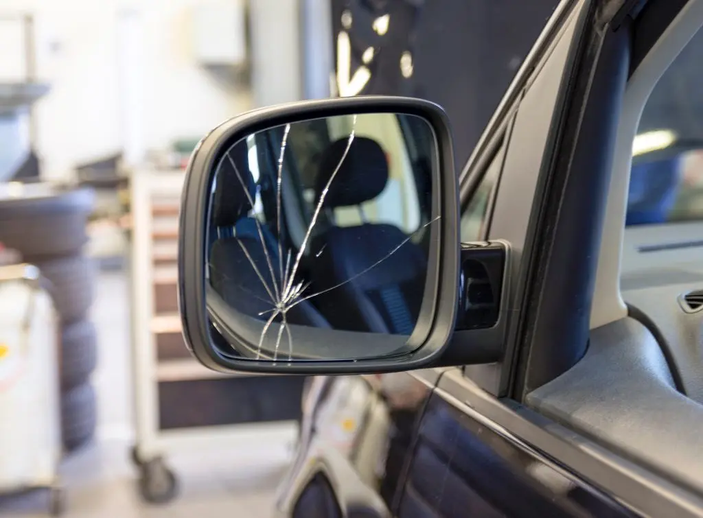 broken wing mirror glass