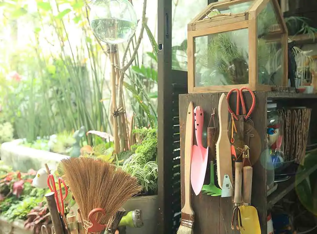 Small greenhouse for plants and tool storage