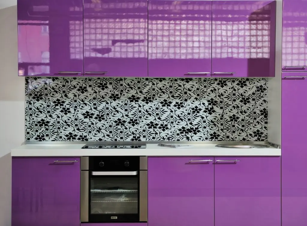 Light purple kitchen galley design with floral splash back