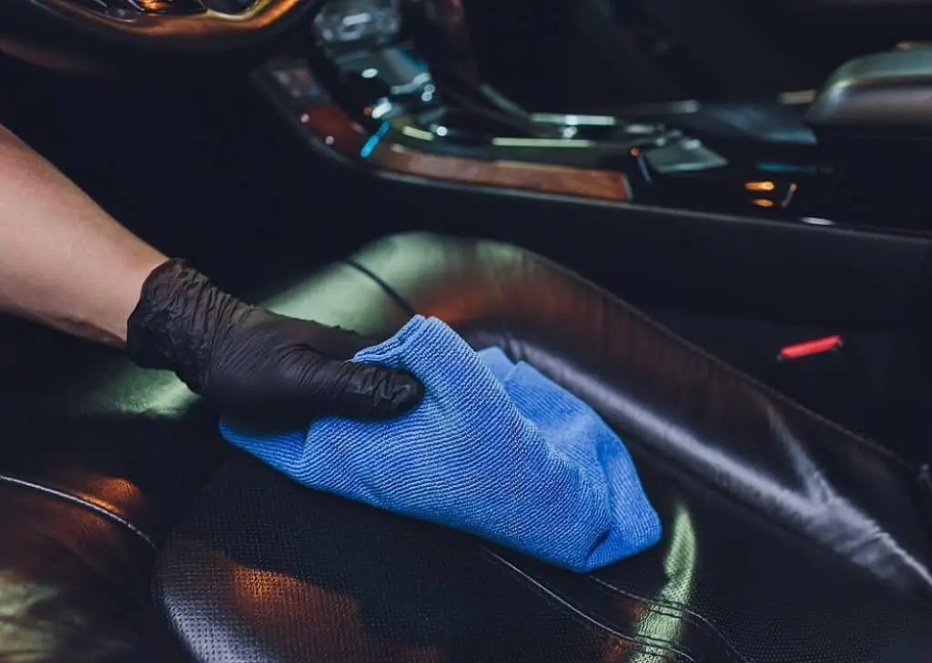 https://www.checkatrade.com/blog/wp-content/uploads/2025/03/cleaning-leather-car-seat-1024x728.jpeg